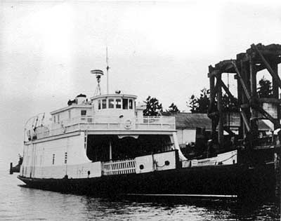 Cy Peck at Ganges wharf, c. 1958