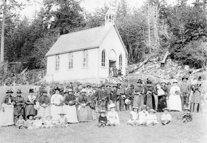 Kanaka people standing outside of St. Paul's Church in Fulford